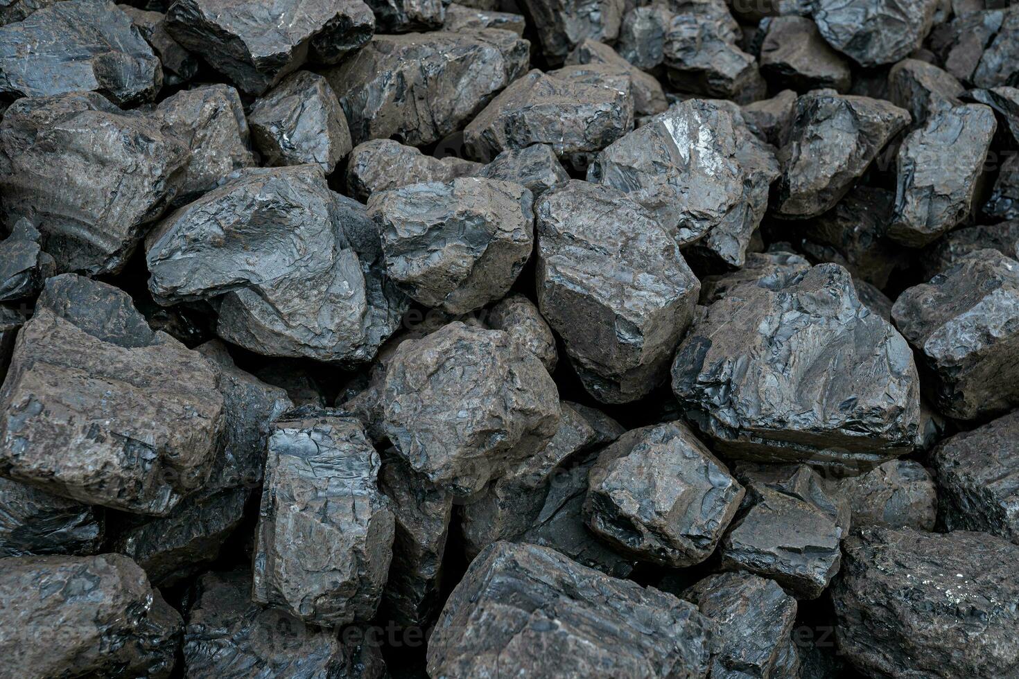 Heap black coal textured background. Mining concept. photo