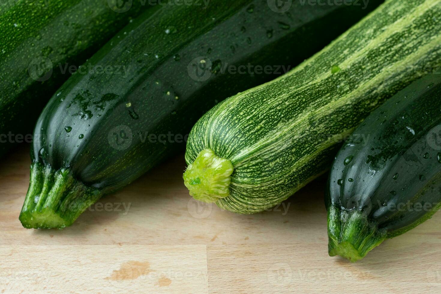 Fresh zucchini on cutting board photo