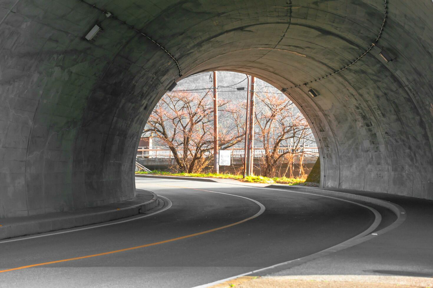 View from inside a traffic road lane tunnel photo