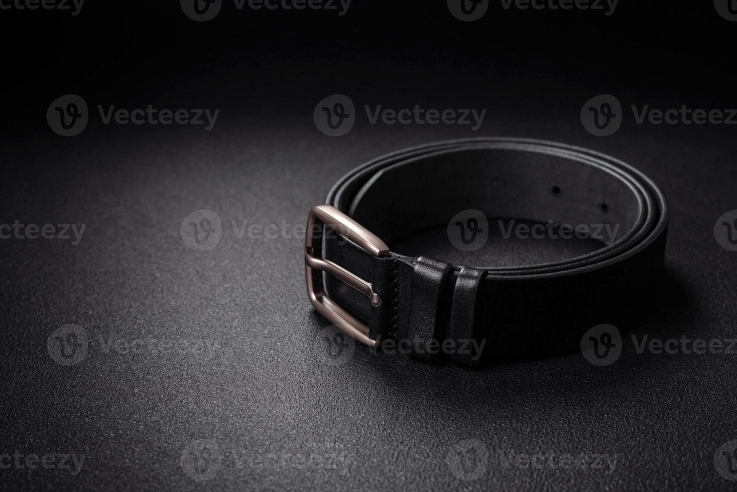 New leather men's belt with an old-style metal buckle photo