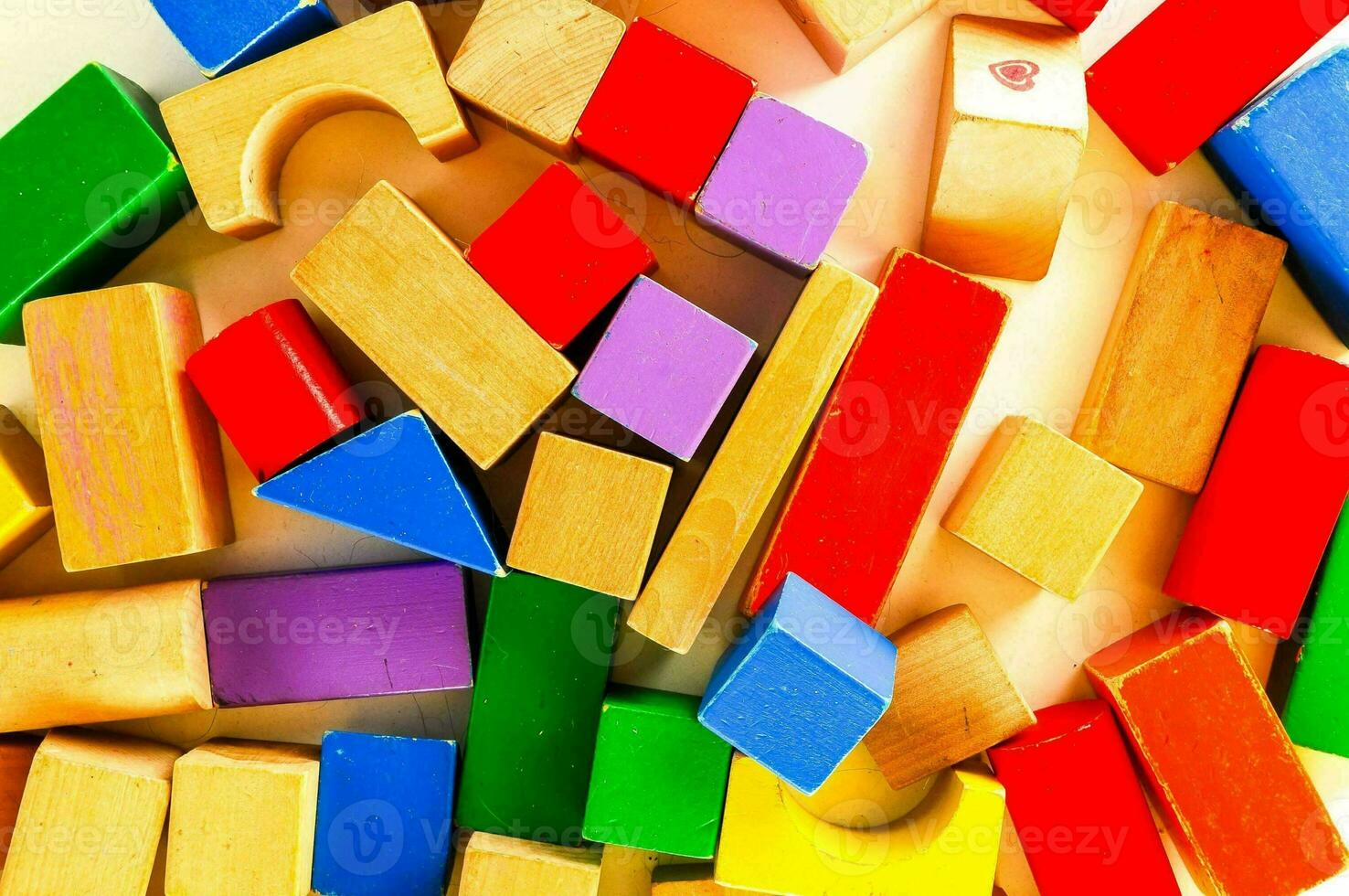 a pile of colorful wooden blocks photo