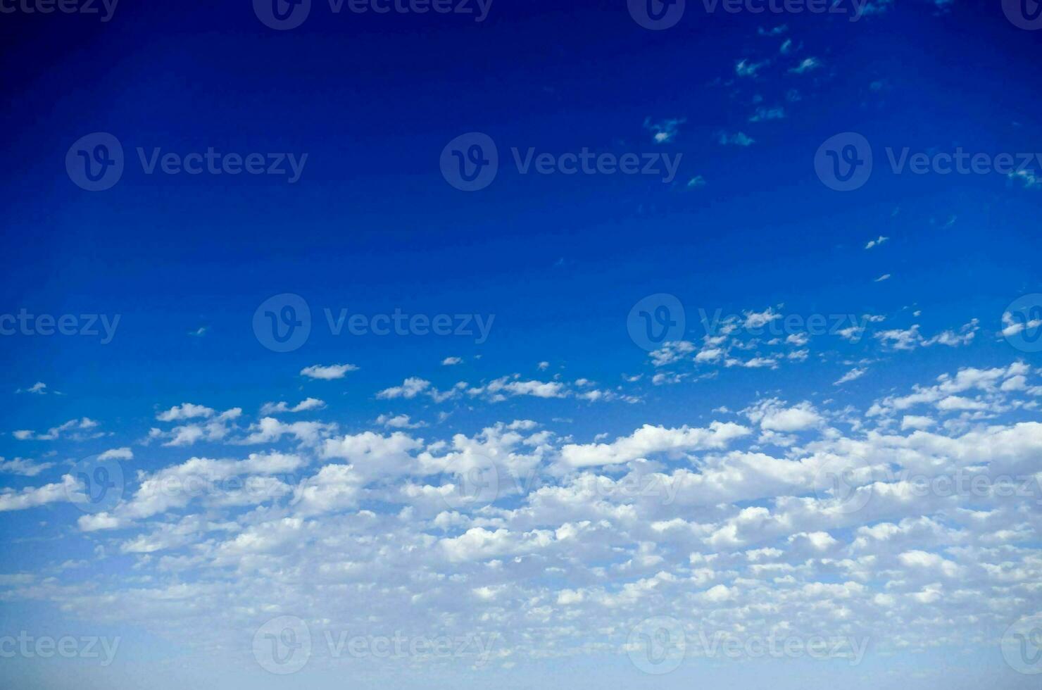 a blue sky with clouds photo