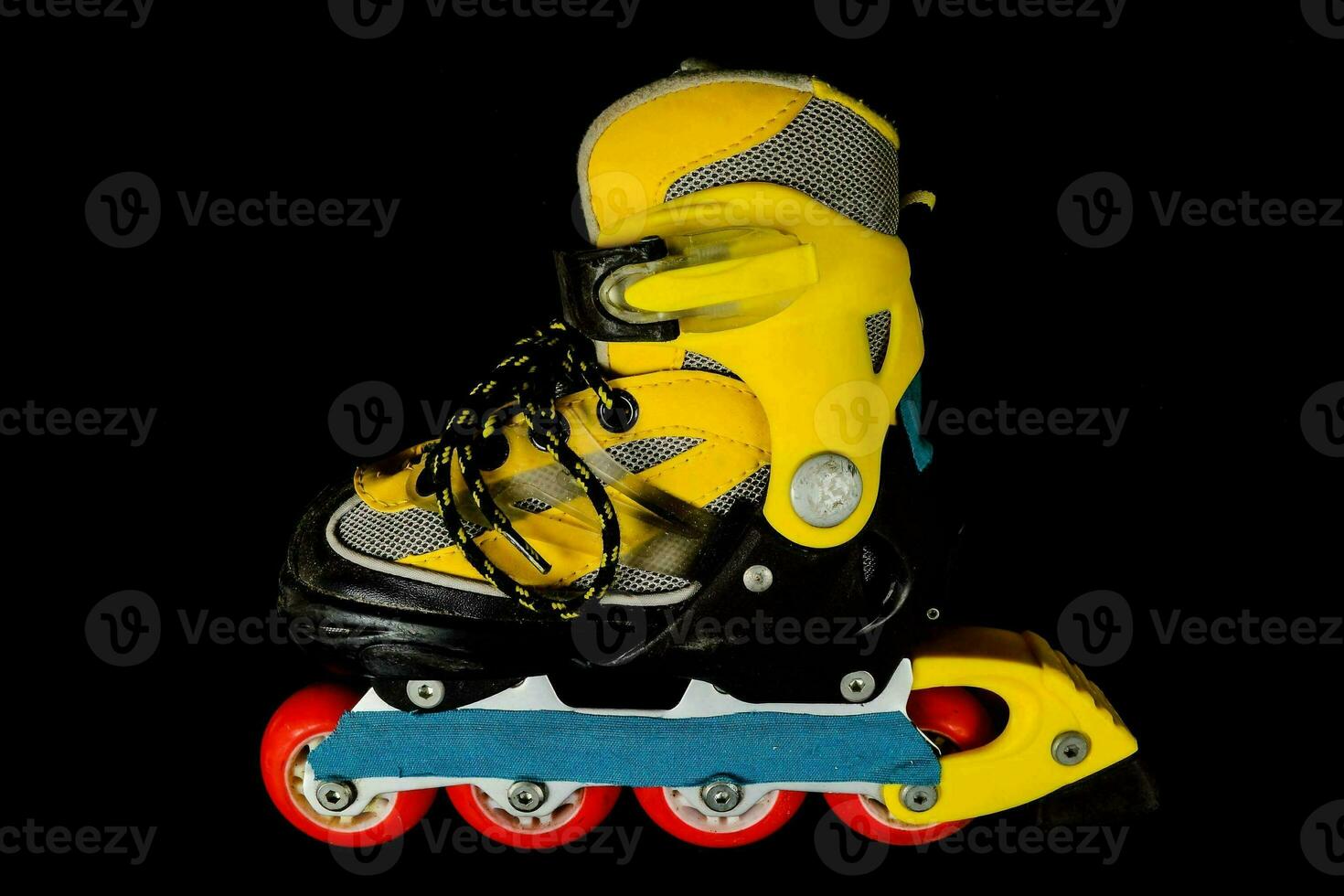 a yellow and black inline skate photo