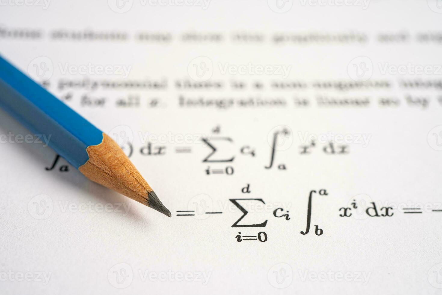 Pencil on mathematic formula exercise test paper in education school. photo