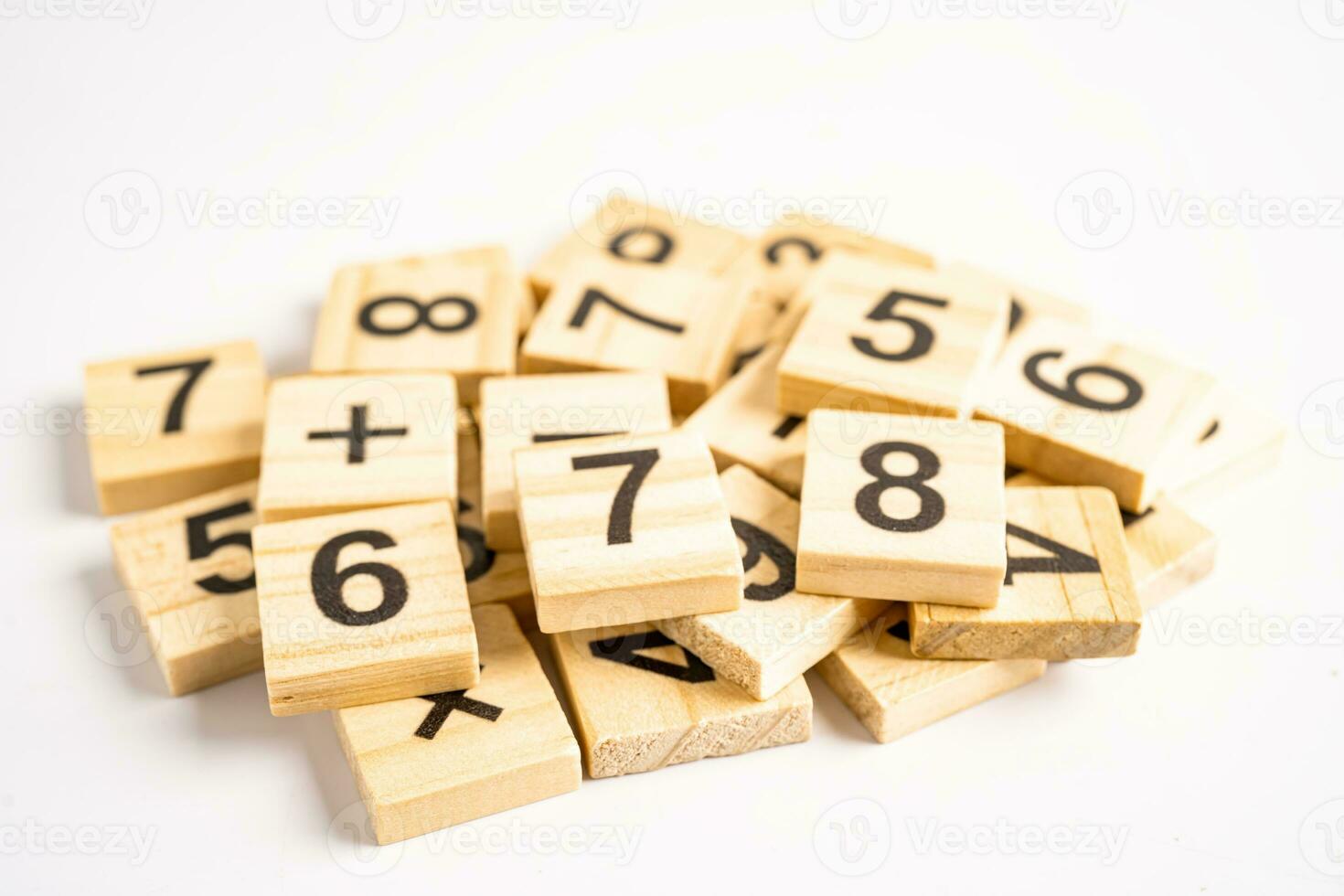 Math number wooden on white background, education study mathematics learning teach concept. photo