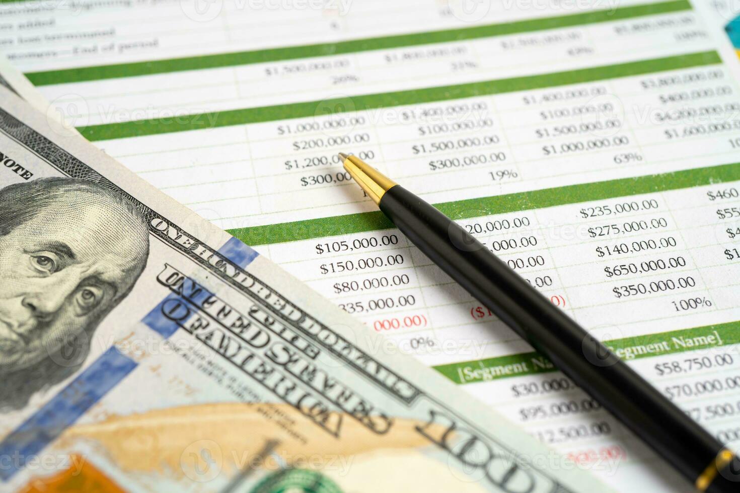 Magnifying glass on graph paper. Financial development, Banking Account, Statistics, Investment Analytic research data economy, Business concept. photo