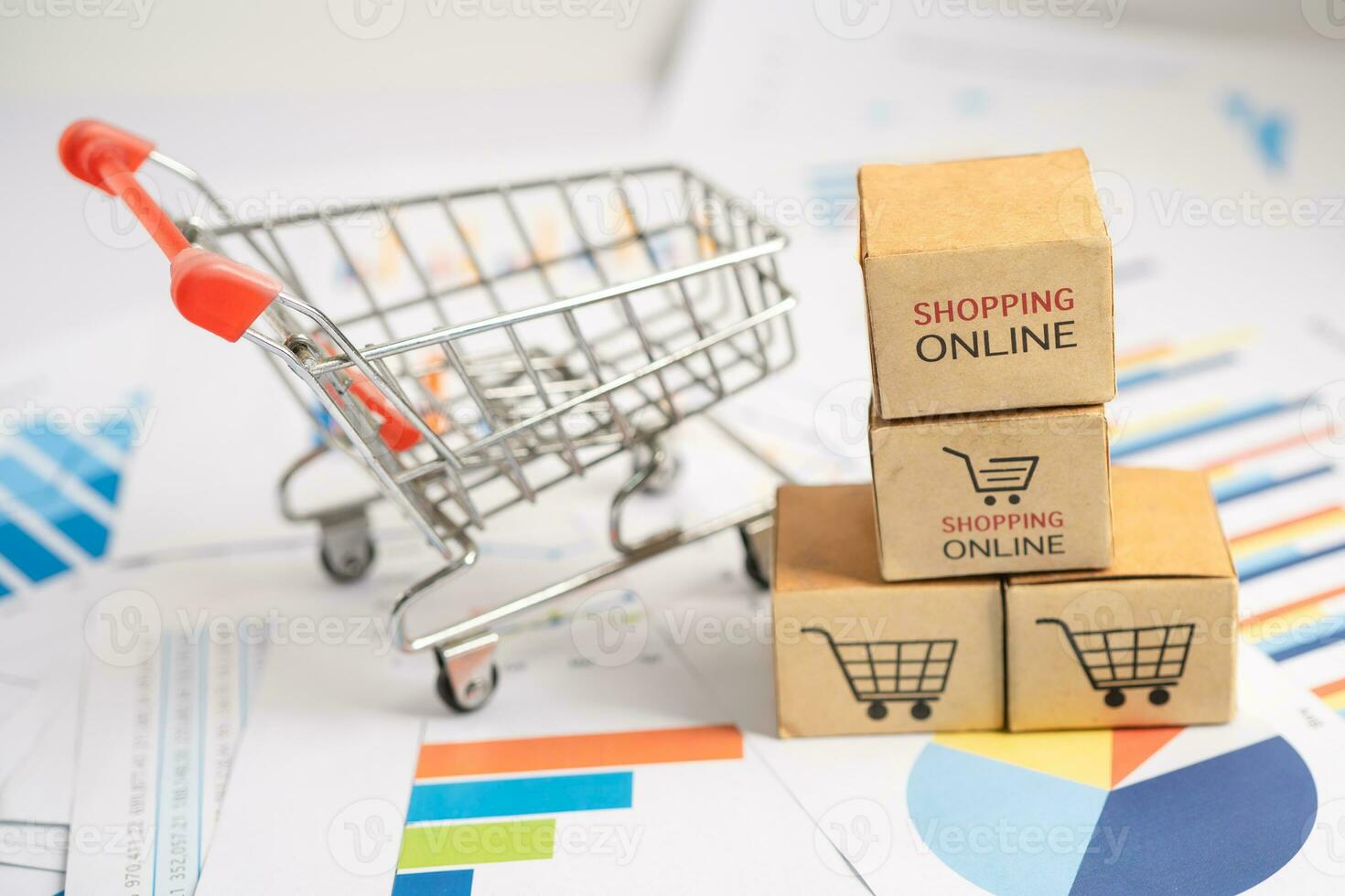 Shopping cart logo on box on graph. Banking Account, Investment economy, trading, Business import export transportation online. photo