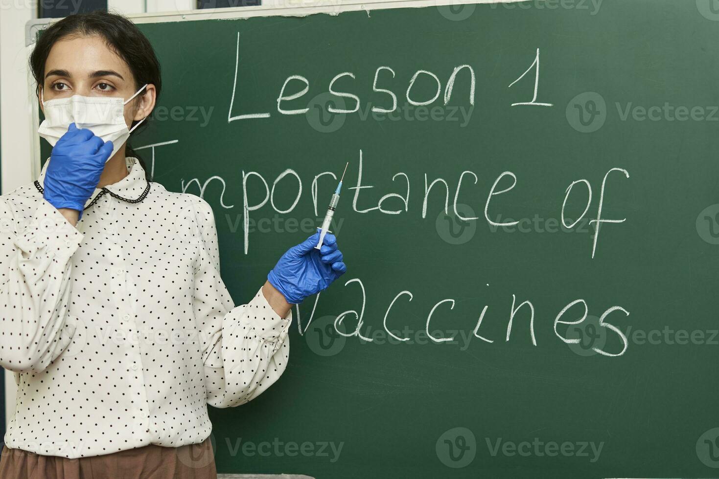 Teacher teaching during covid 19 pandemic photo