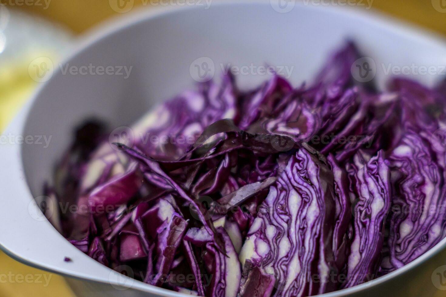 Close-up of a bowl with chopped red cabbage photo