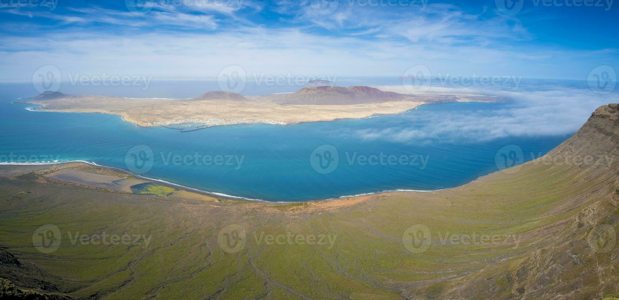 Aerial view on island La Graciosa next to Lanzarote. Part of the Canary Islands of Spain photo