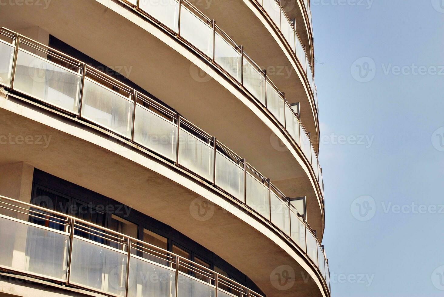 Brand new apartment building on sunny day. Modern residential architecture. Modern multi-family apartment house. photo