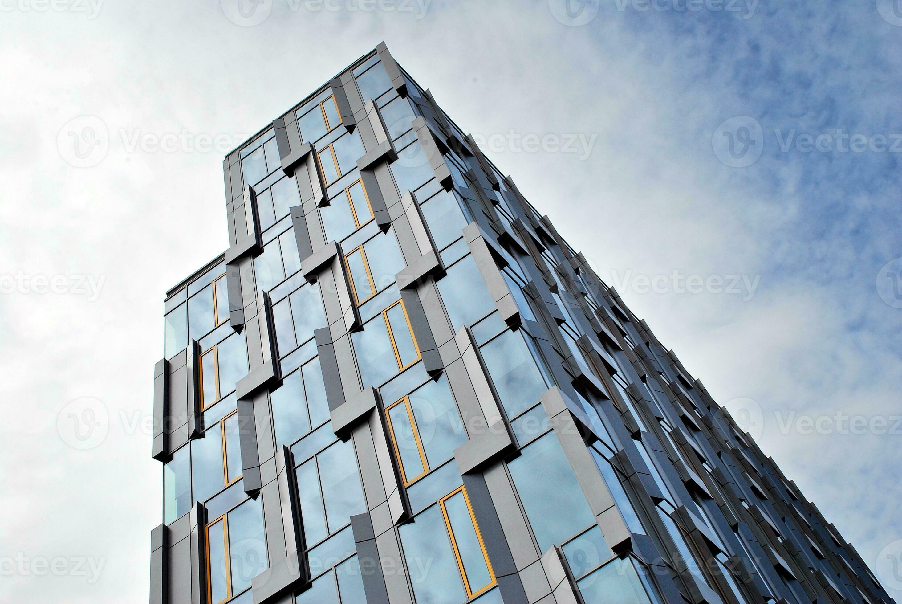 Fragment of glass and metal facade walls. Commercial office buildings ...