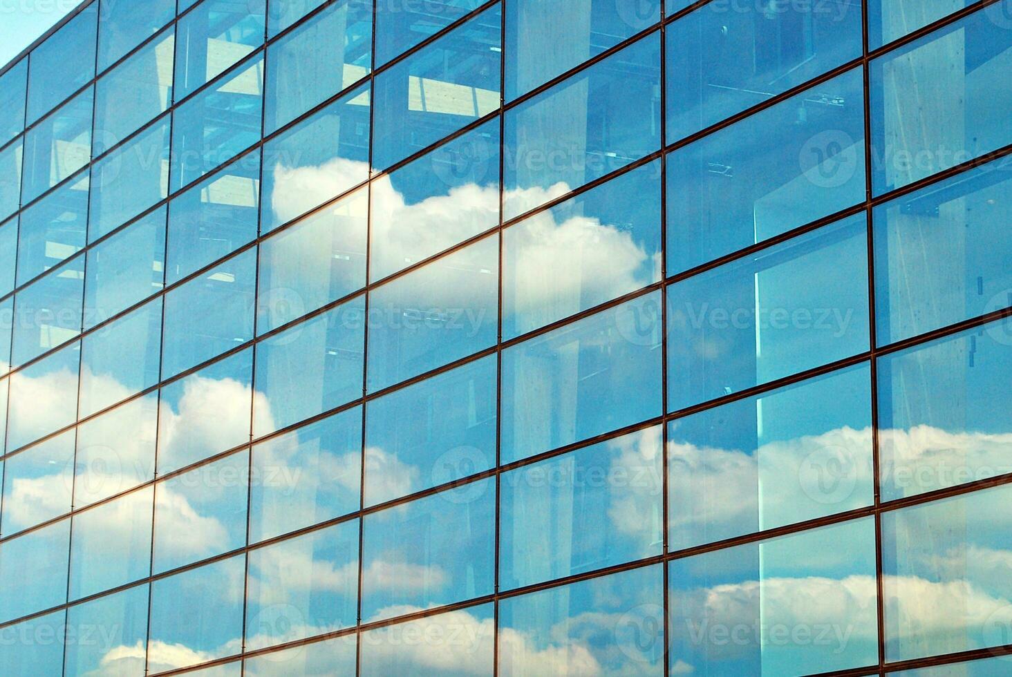 Fragment of glass and metal facade walls. Commercial office buildings. Abstract modern business architecture. photo