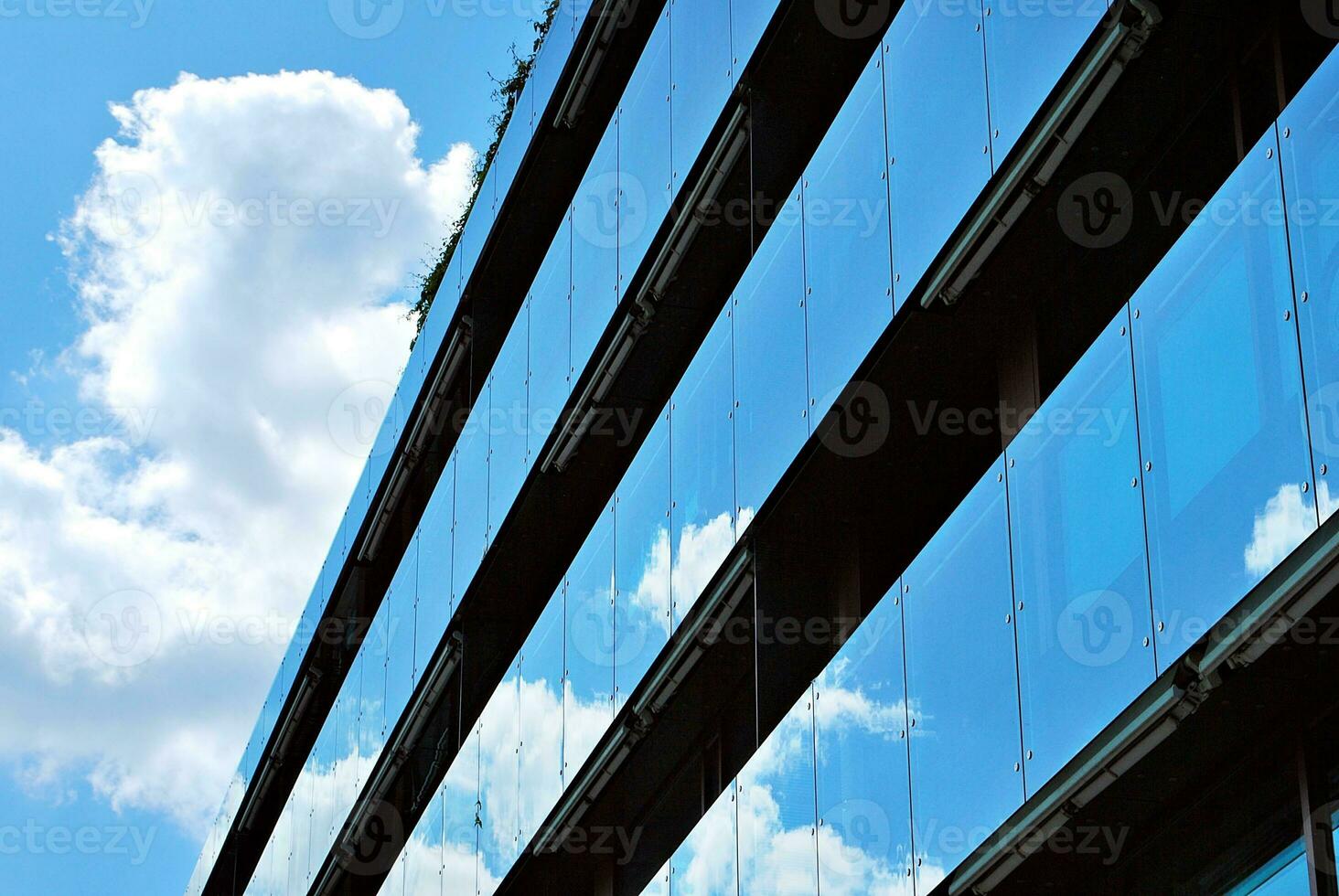 Brand new apartment building on sunny day. Modern residential architecture. Modern multi-family apartment house. photo