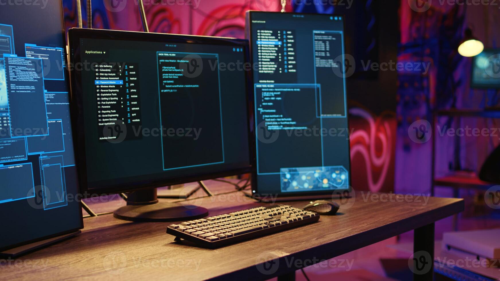 Empty neon illuminated basement with graffiti drawings on walls and advanced technology computers left open running code. Underground warehouse used as crime haven by hackers photo