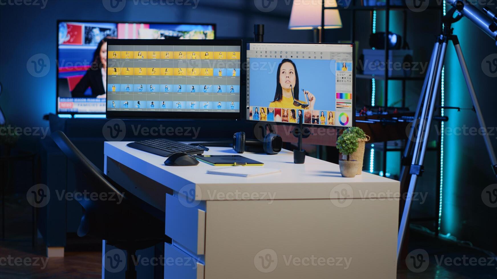 Media company creative office with multi monitors setup used for post processing retouching of images. Editing software interface on computer screens in professional graphic design workspace photo