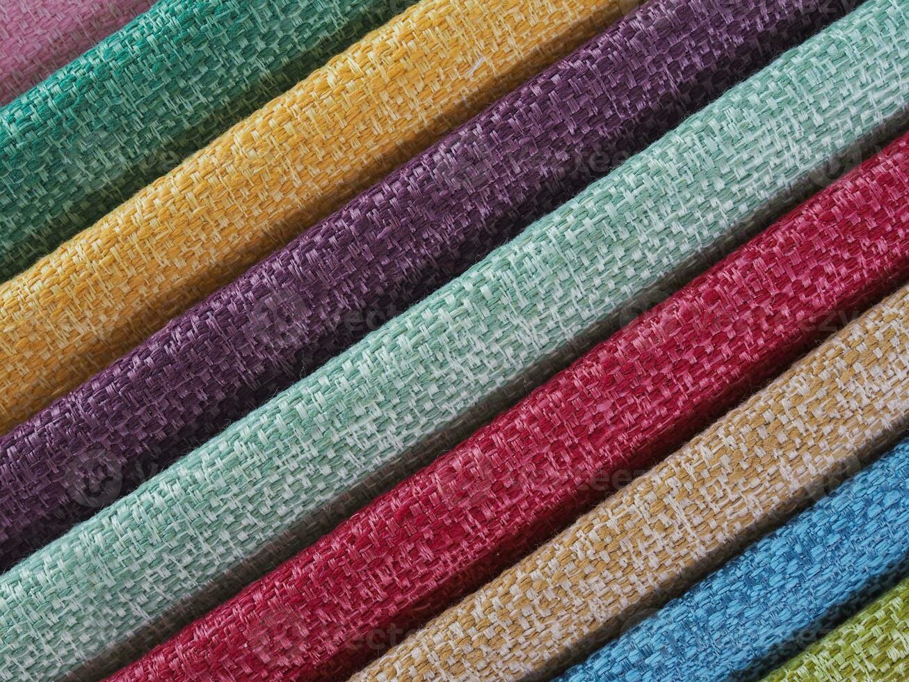 Colorful background, A stack of colorful fabric. Full frame shot of muti colored fabric background photo