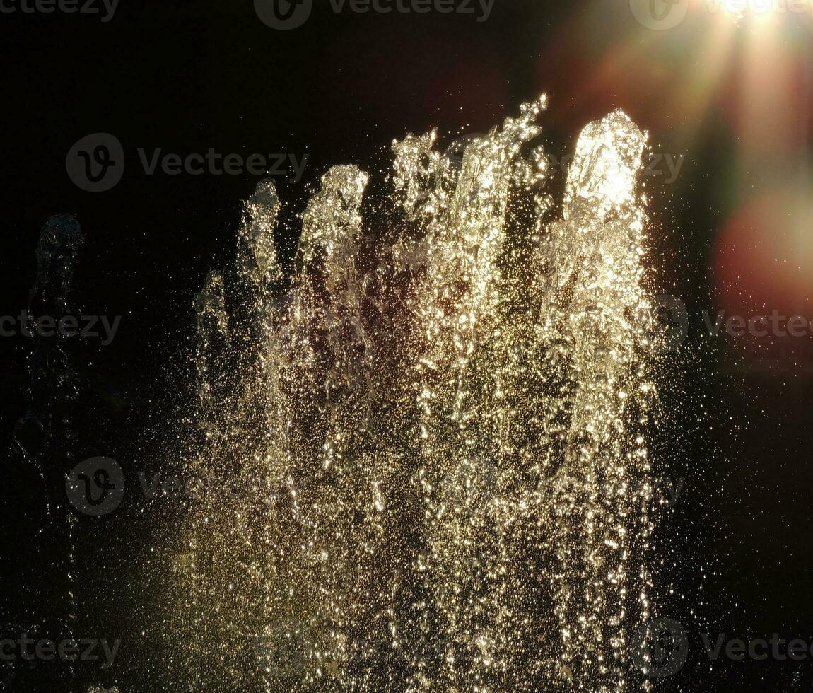 Fountain Jet In Rays Of Backlight Detailed Stock Photo