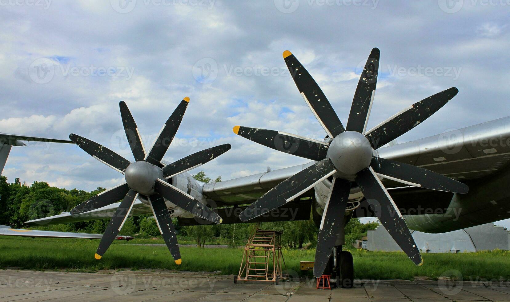Landing Gear And Wing Of Plane With Propeller Blades photo