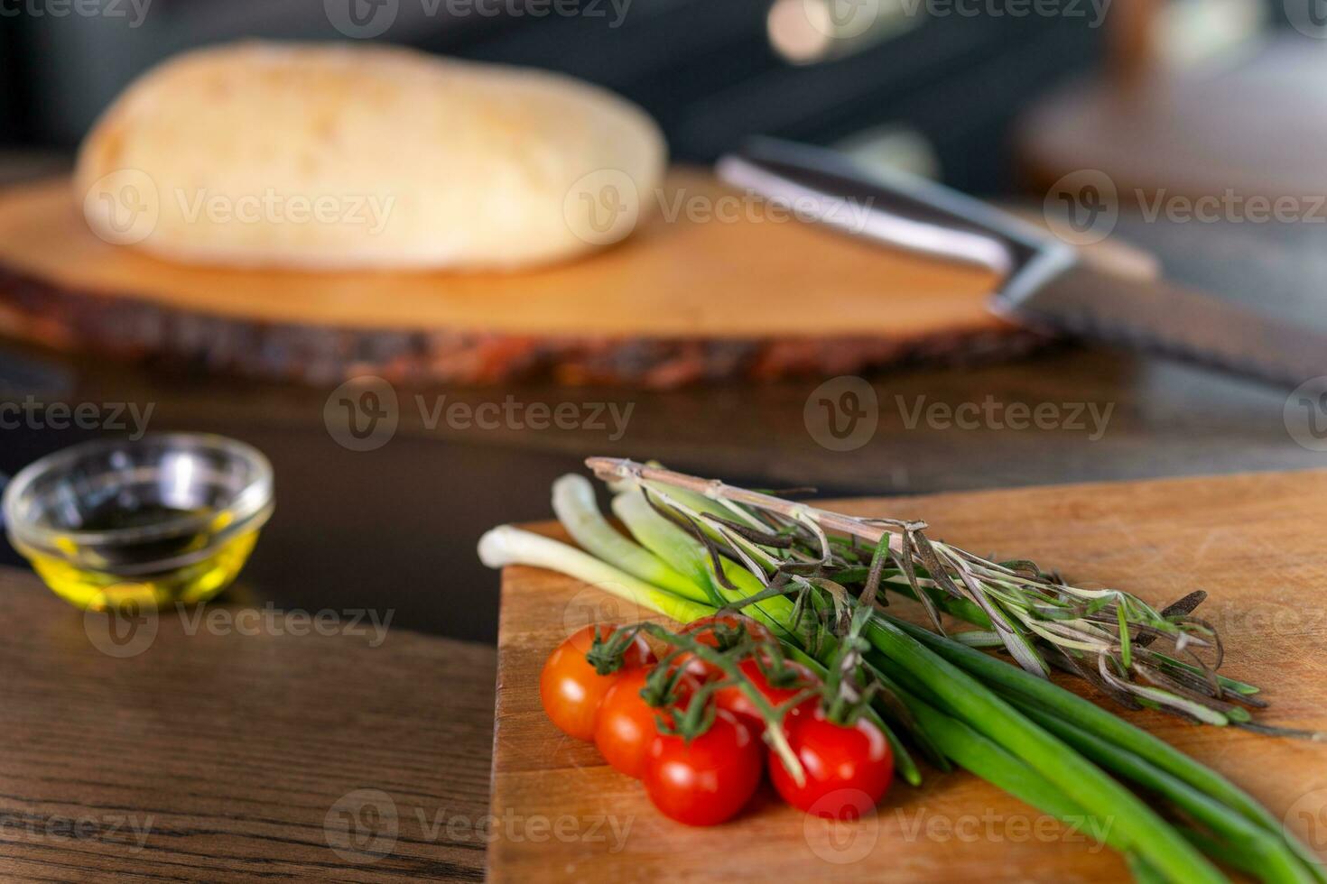 Fresh bread and ingredients for cooking snacks on table. photo
