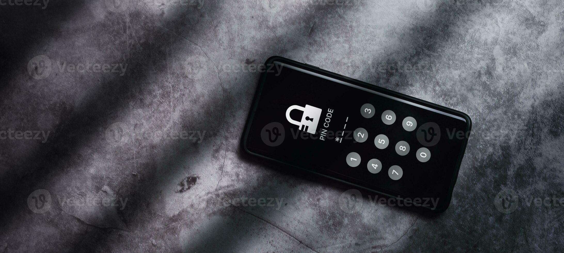 Top view of smartphone with two factor authentication to protect information on screen. Cybersecurity and privacy protect data. Pin code. Cyber hacker threat. photo