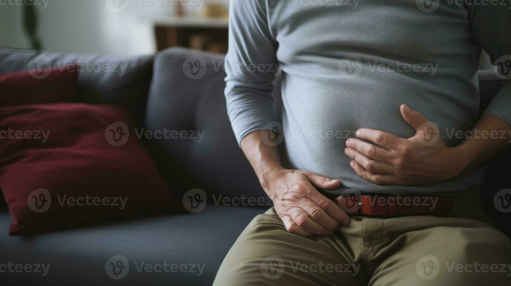 AI generated Man holding his stomach in hand in pain reflecting his stomach ache. Generative AI photo