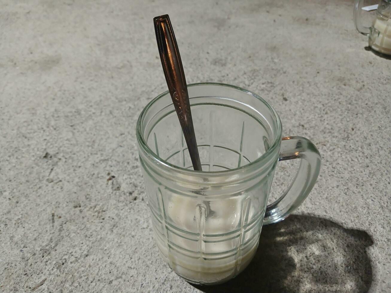 Glasses of ginger milk at a street stall photo
