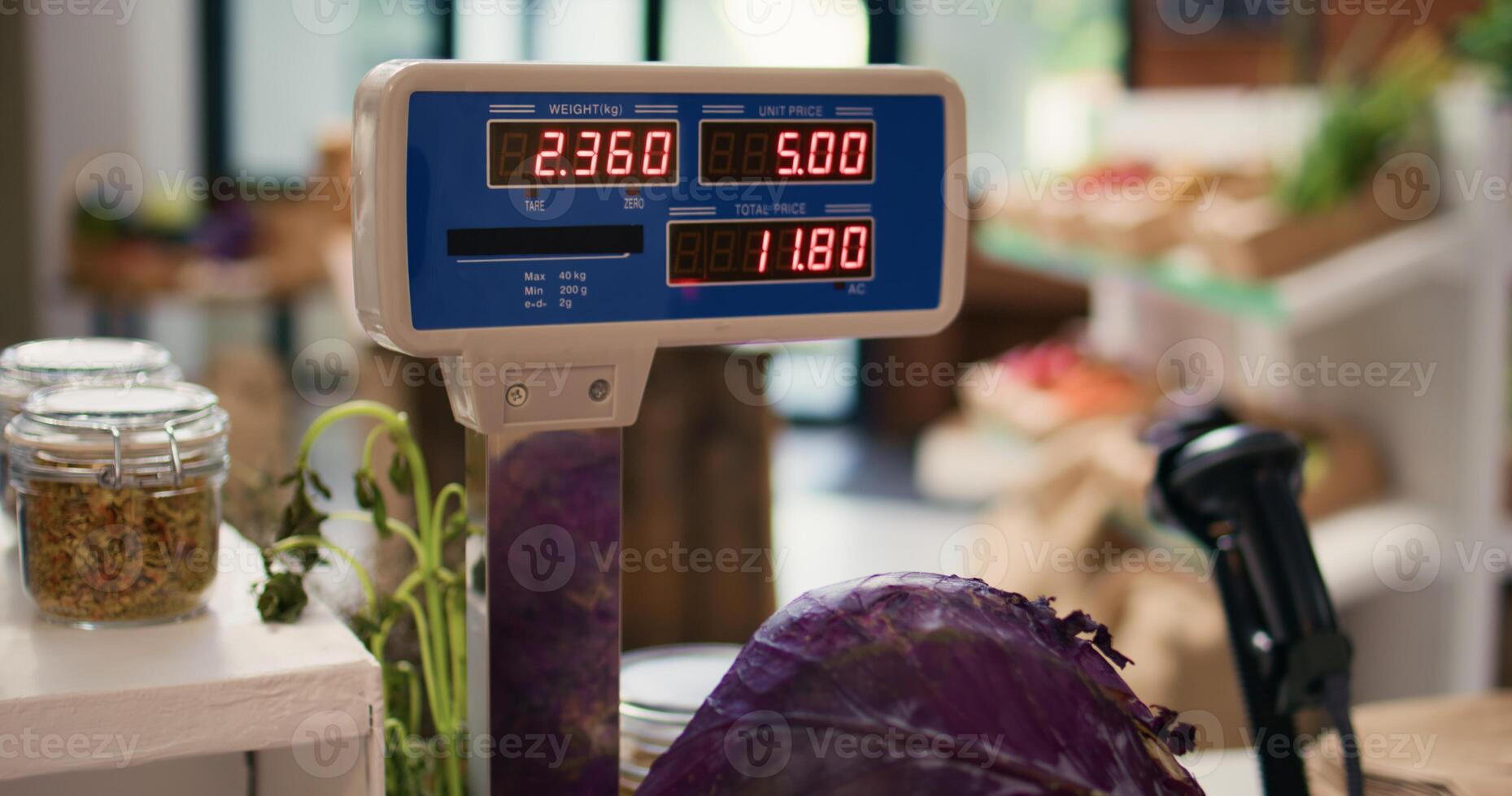 Supermarket scale used on bulk items to weight all fruits and veggies, sustainable healthy eating concept. Empty organic shop selling freshly harvested products and homemade supplies. photo