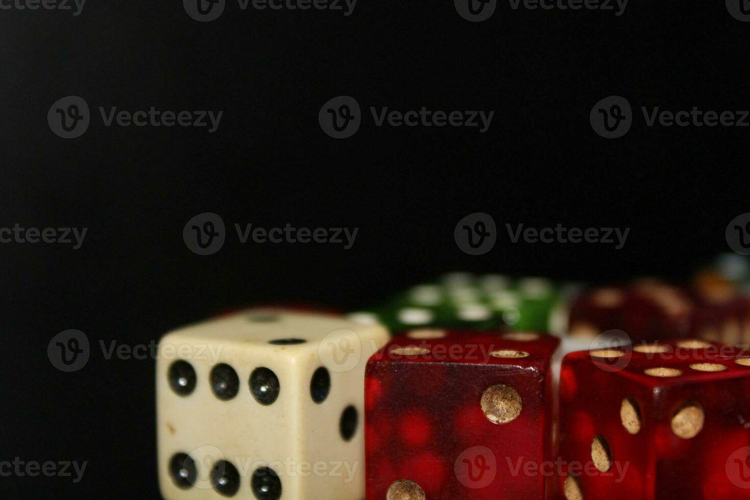 Pile Of Different Colored and Shaped  Dice photo