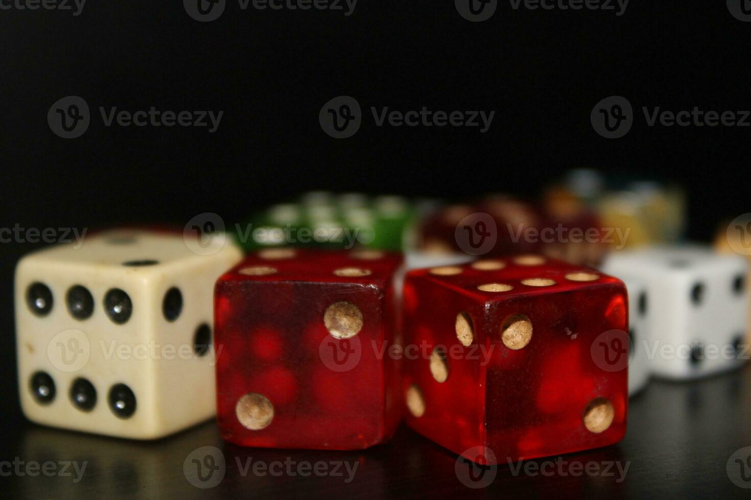 Pile Of Different Colored and Shaped  Dice photo