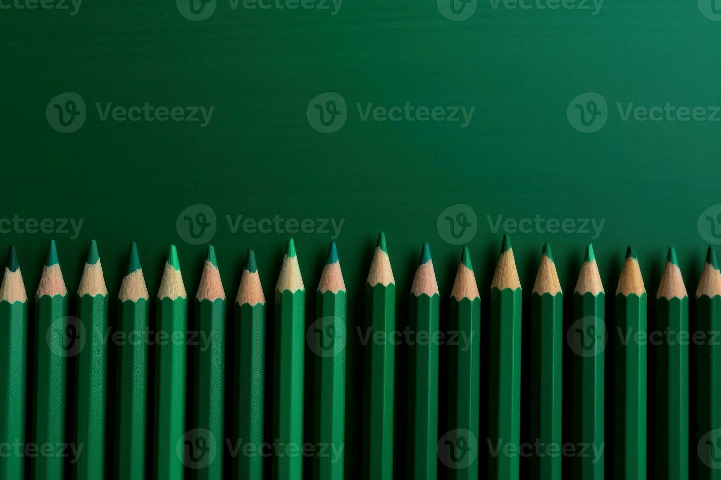 AI generated Green shades pencils row on greenery background. Generate ai photo