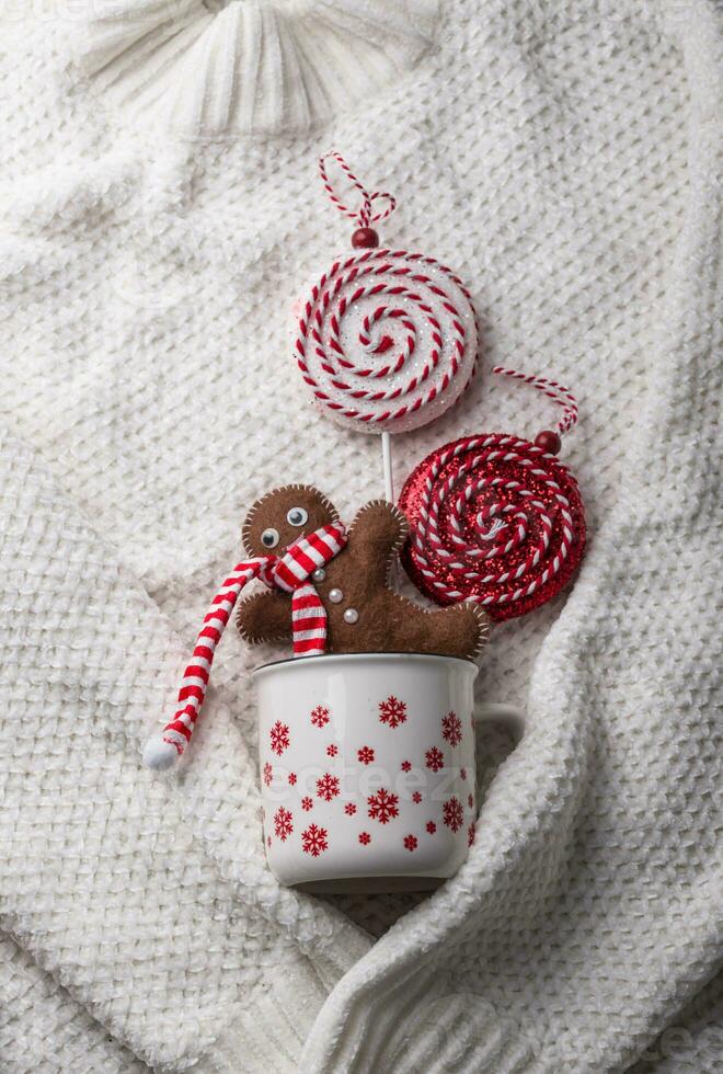 Christmas composition in white knitted background photo