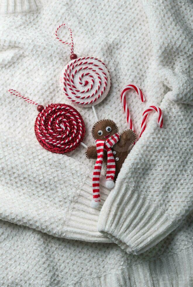 Christmas composition in white knitted background photo