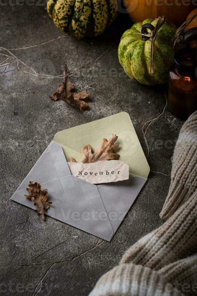 Autumn November still life with letter photo