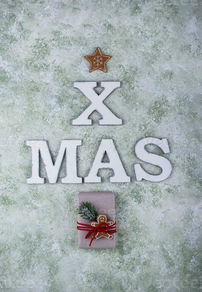 Wooden letter XMAS, Christmas festive card photo