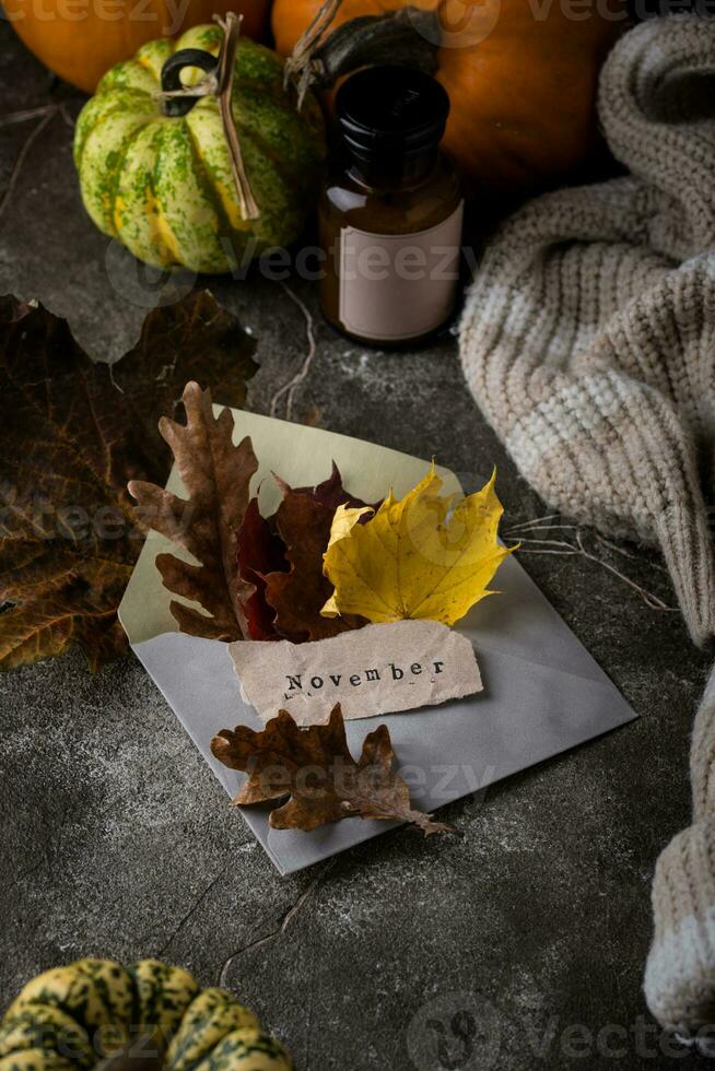 Autumn November still life with letter photo