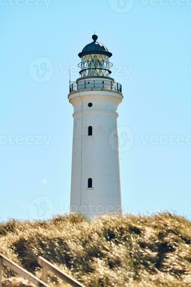 Lighthouse Hirtshals Fyr at the danish coast photo