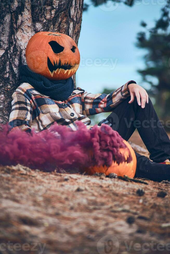 Person with pumpkin head photo