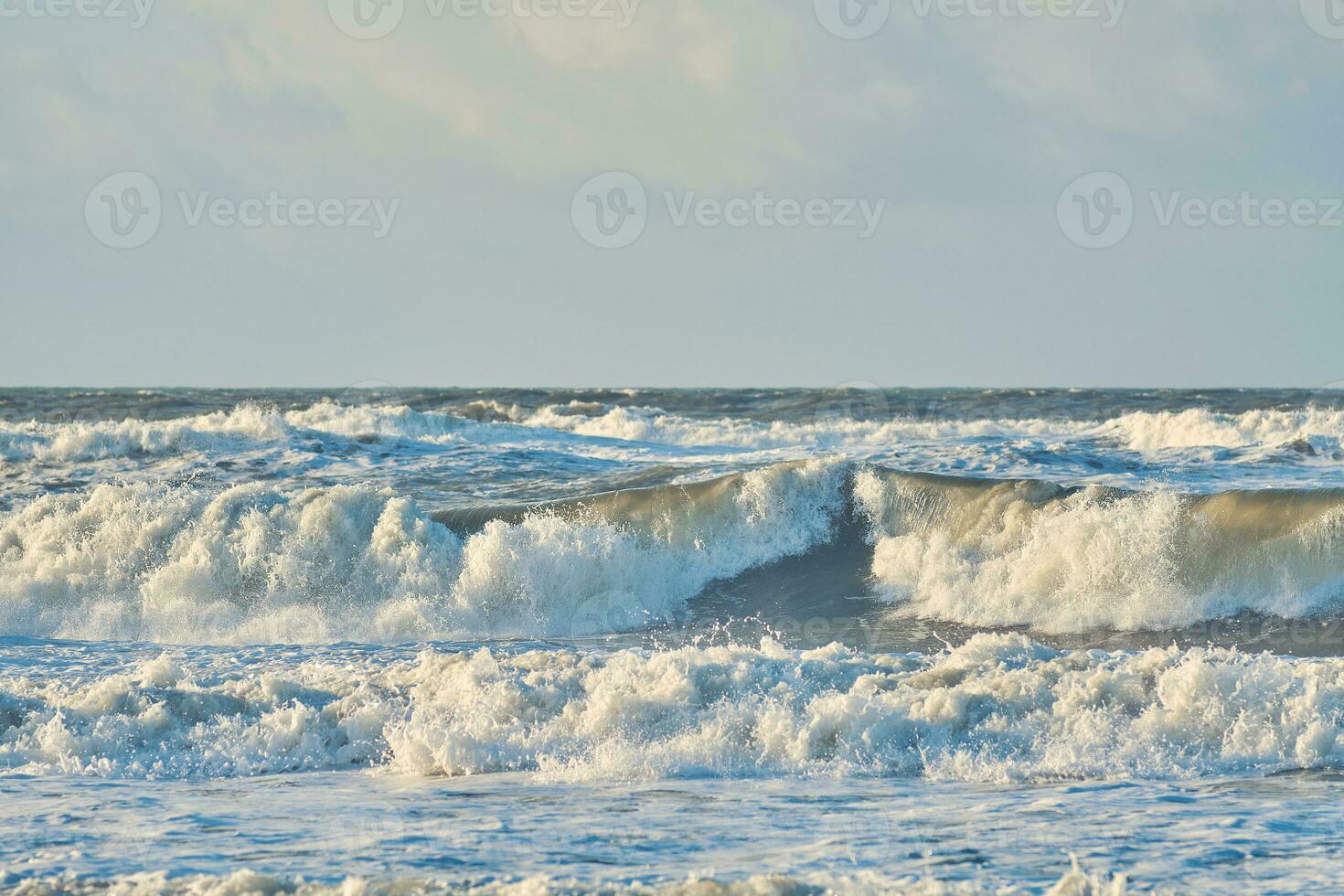 Waves at north sea coast in denmark photo