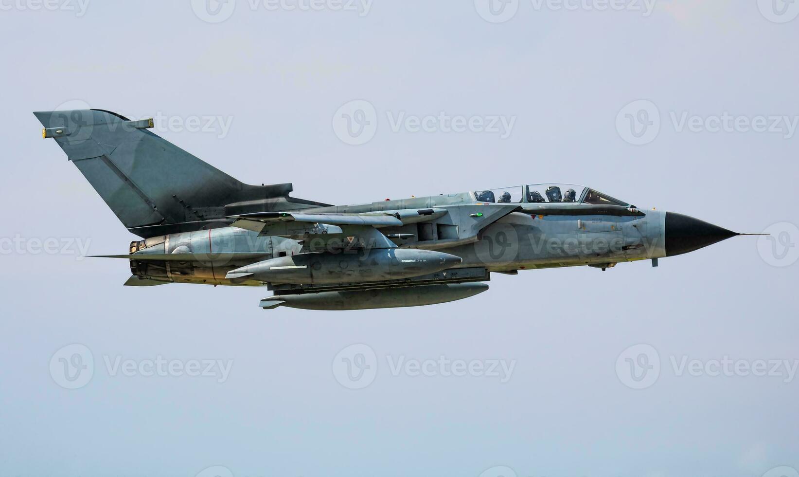 Military fighter jet plane at air base. Airport and airfield. Air force flight operation. Aviation and aircraft. Air defense. Military industry. Fly and flying. photo