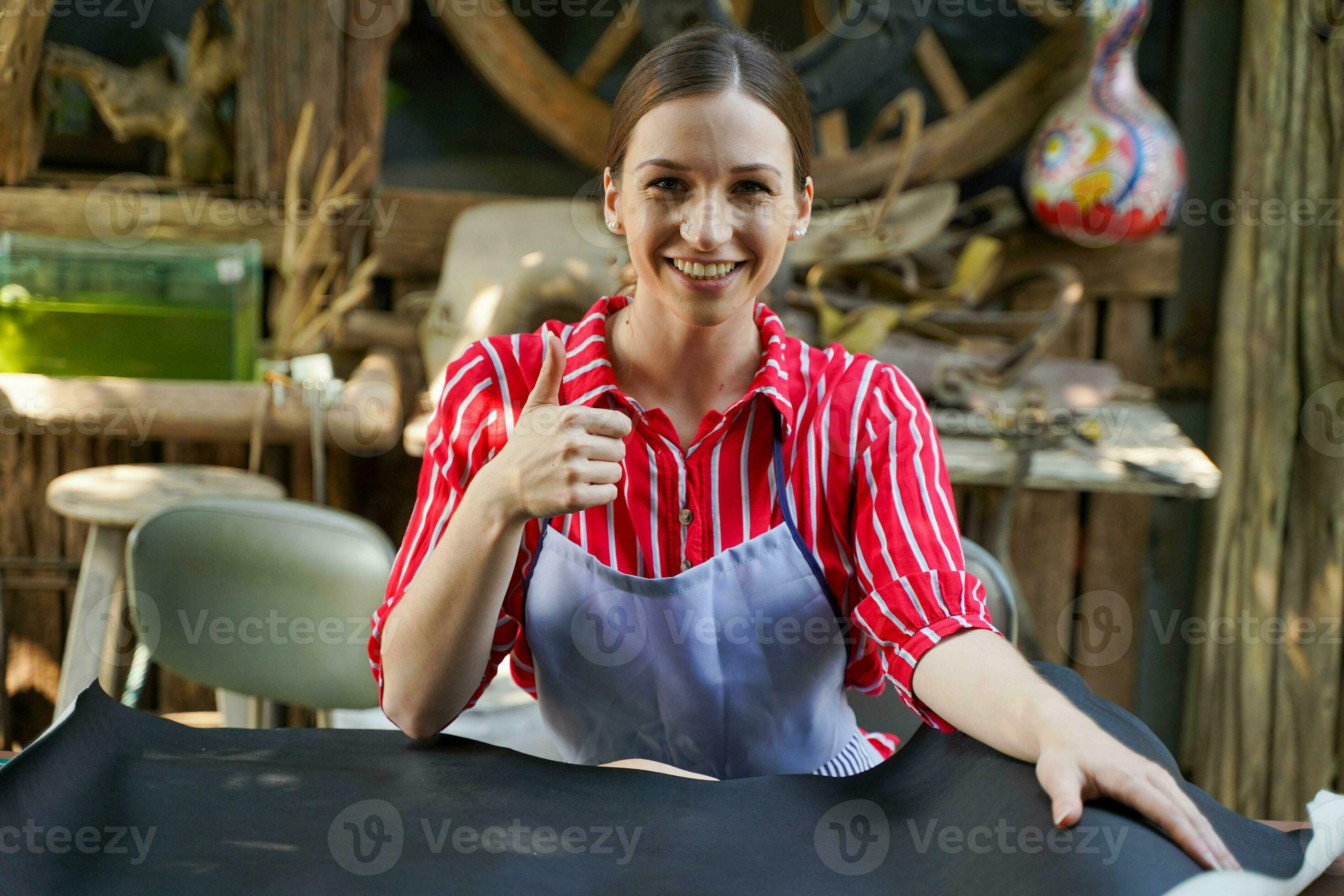 Premium Photo  Closeup hand of leather craftsman is carefully to