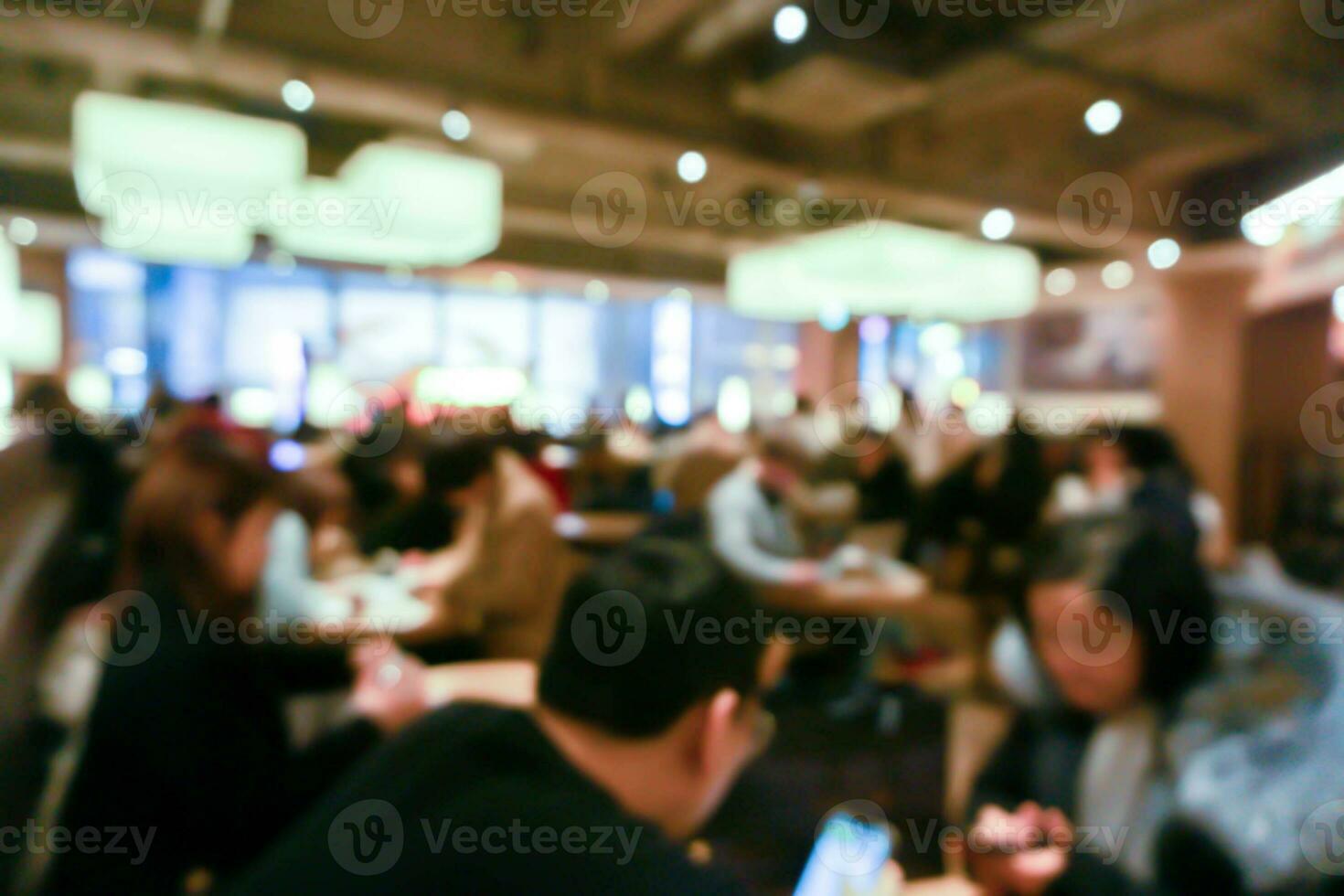 Blurred of peoples and tourists in a modern restaurant photo