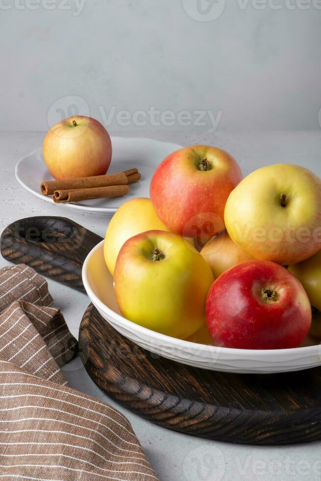 Beautiful ripe apples on a plate. Selective focus. photo