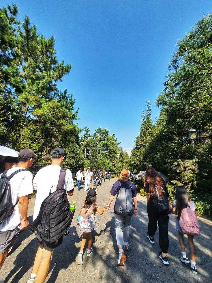 Osaka, Japan on September 30, 2023. Visitors entering and exiting The Wizarding World of Harry Potter. photo