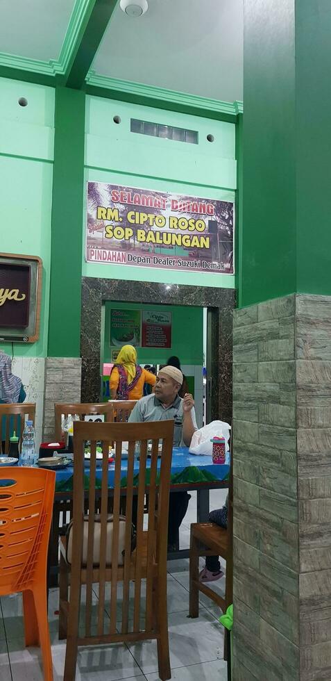 Demak, Indonesia on July 8 2017. Conditions in a restaurant in the city of Demak, Cipto Roso Special Sop Balungan Restaurant. photo