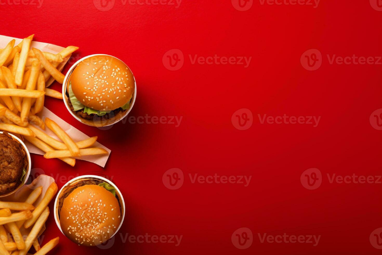 AI generated Homemade hamburger with fresh vegetables and french fries on dark background photo