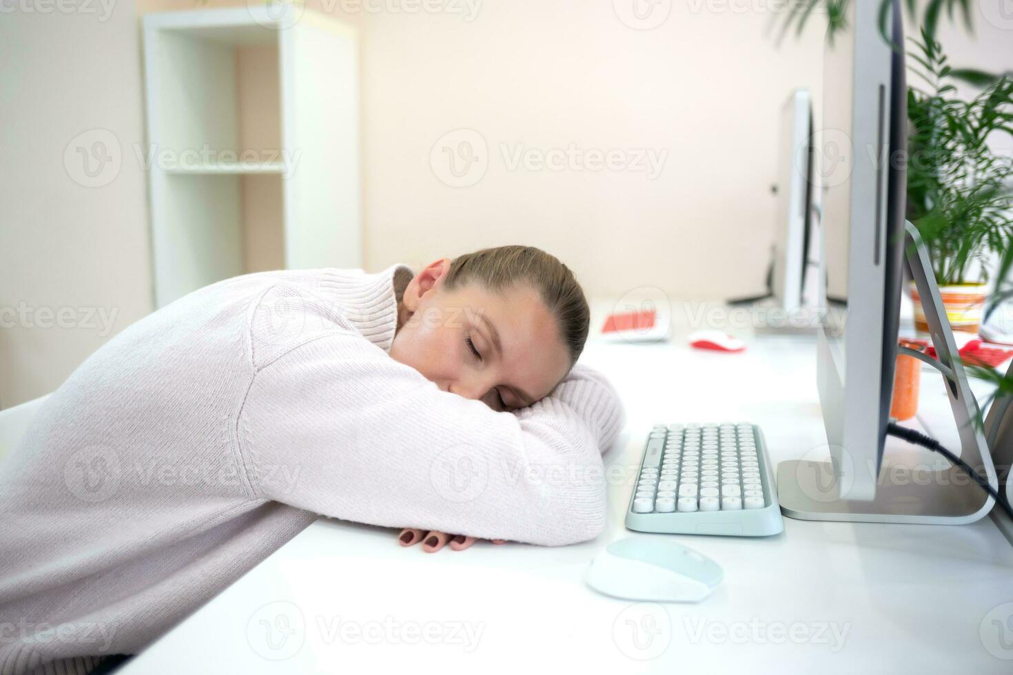 young woman is sad at the workplace. office work concep photo
