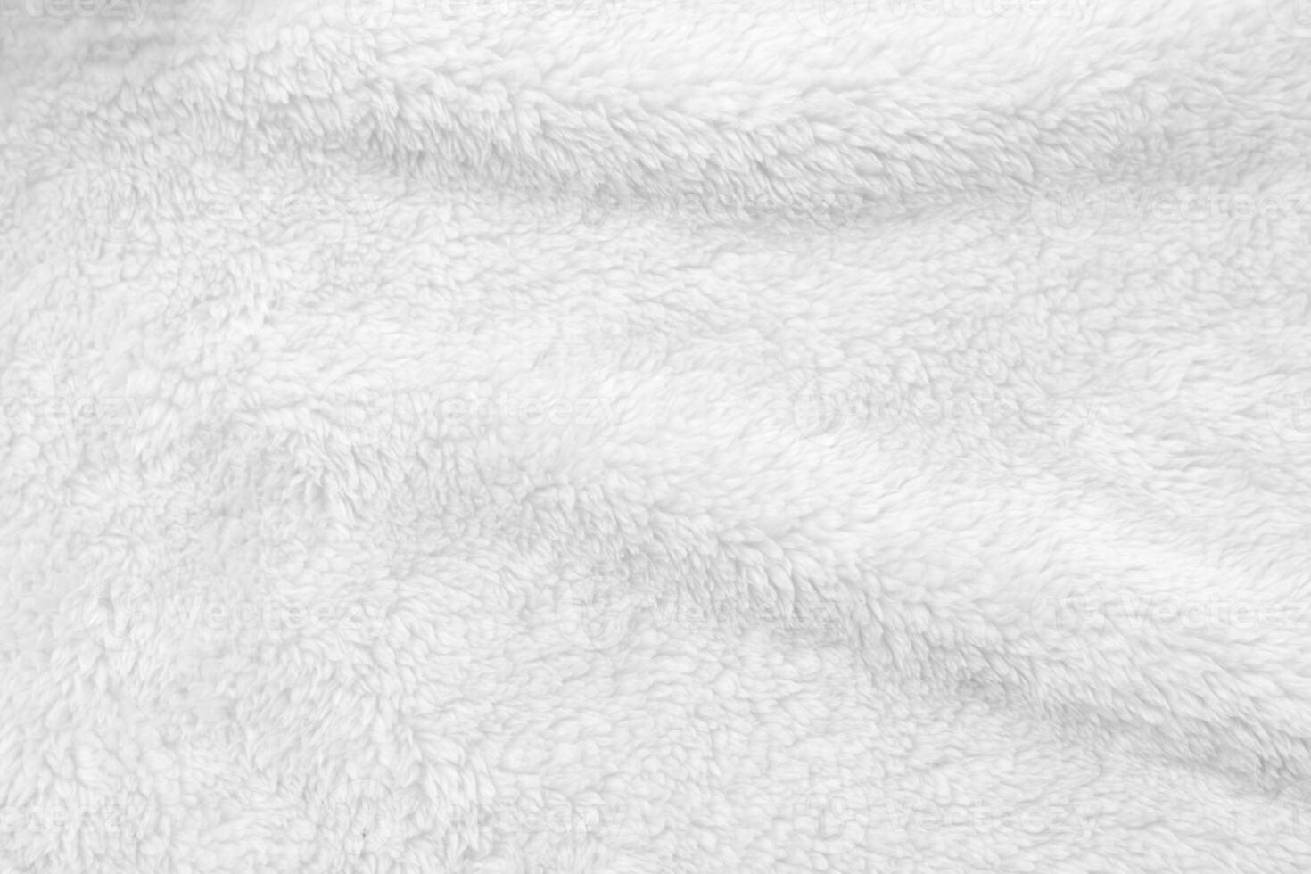 White clean wool texture background. light natural sheep wool. white seamless cotton. texture of fluffy fur for designers. close-up fragment white wool carpet. photo