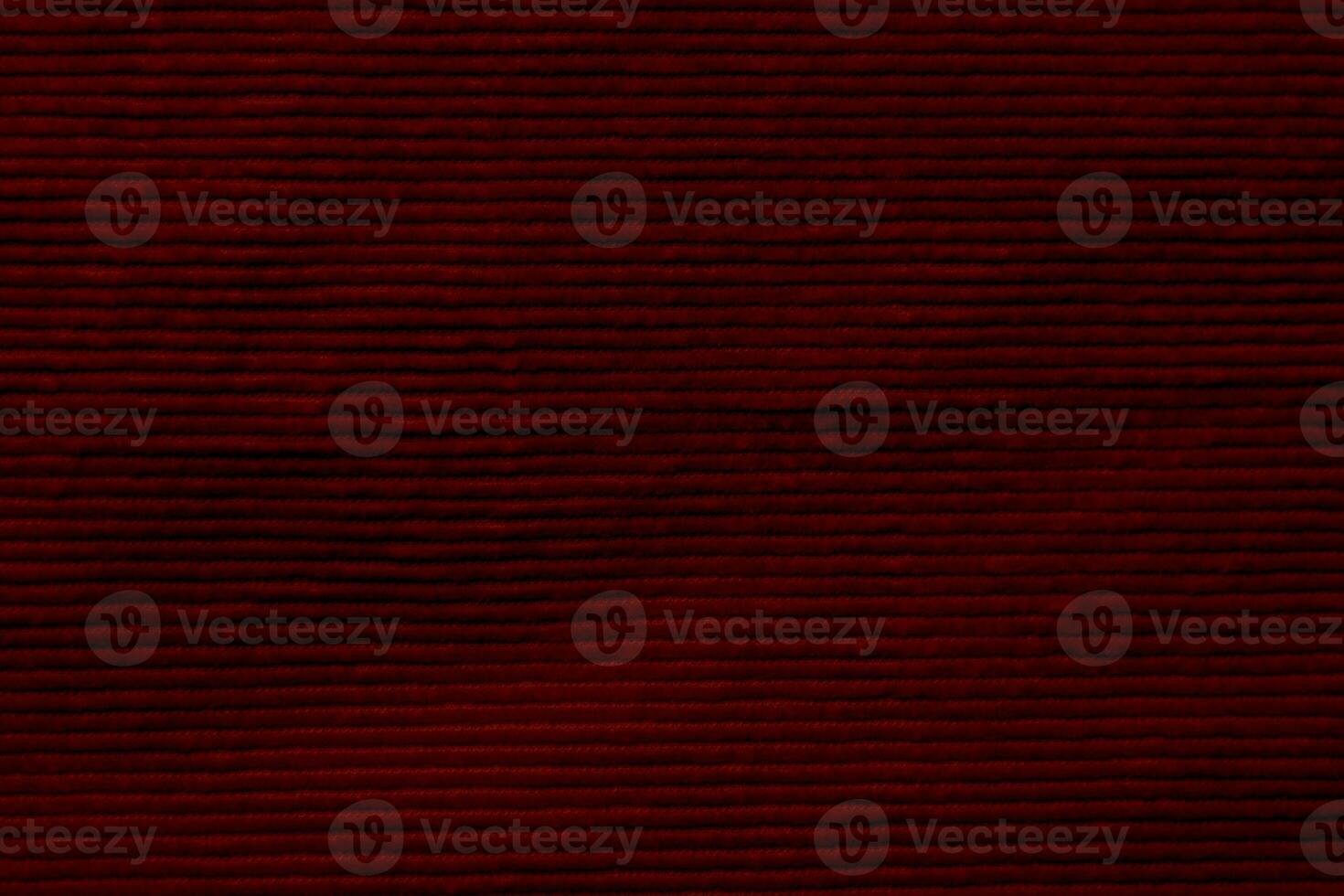 red corduroy fabric texture used as background. clean fabric background of soft and smooth textile material. cloth, velvet, .luxury scarlet tone for silk. photo