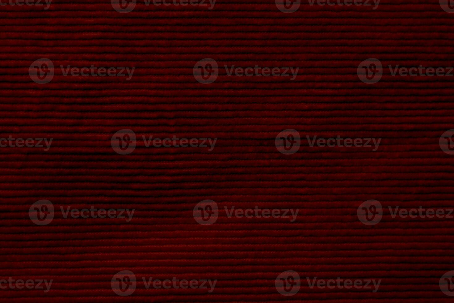 red corduroy fabric texture used as background. clean fabric background of soft and smooth textile material. cloth, velvet, .luxury scarlet tone for silk. photo